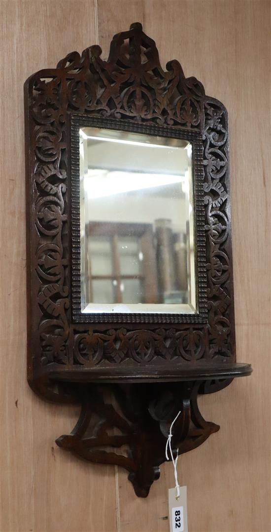 A pair of late Victorian fretwork wall mirrors H.80cm
